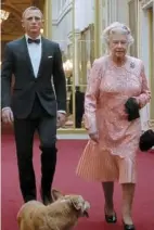  ?? ?? Her Majesty and Bond actor Craig in a sketch for the opening ceremony of the London Olympic Games. — Filepic