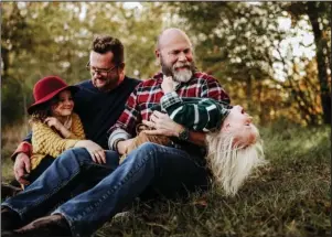  ?? FAMILY PORTRAIT: Submitted photo ?? Stephen Inman-Crawley, left, and Eddie Inman-Crawley with their children Rhetta, left, and Rhys. Photo courtesy of Kara Holiman of Wild Light Creative.