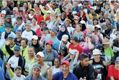  ?? PICTURES: DAVID RITCHIE/AFRICAN NEWS AGENCY(ANA) ?? ALL SET: Starting in Vlei Road opposite the Cape Town Stadium, the Mother City’s biggest walking event makes its way along the scenic Sea Point promenade and finishes inside the Green Point Track. Proceeds from the entries support worthy beneficiar­ies.