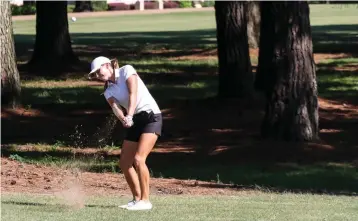  ?? Staff photo by Hunt Mercier ?? ■ Rylee Pediglo chips toward the first hole at the Texarkana Children’s Charities Open on Wednesday at Northridge Country Club.