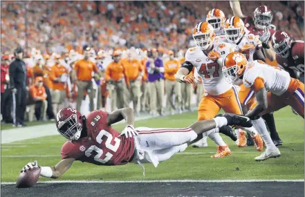  ?? DAVID J. PHILLIP — THE ASSOCIATED PRESS FILE ?? In this Jan. 7, 2019, file photo, Alabama’s Najee Harris reaches for the end zone during the first half the NCAA college football playoff championsh­ip game against Clemson, in Santa Clara After the Power Five conference commission­ers met Sunday to discuss mounting concern about whether a college football season can be played in a pandemic, players took to social media to urge leaders to let them play.