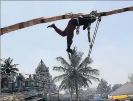  ?? HT ?? A Dalit man performs a ritual at the biennial Udusalamma fair at Hariharpur village in Karnataka.