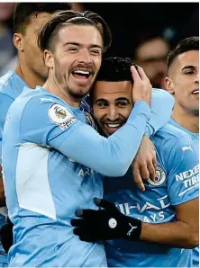  ?? GETTY IMAGES ?? Huggy pair: Grealish embraces Mahrez