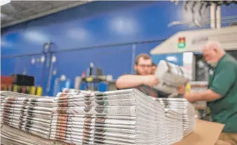  ?? ANGELA MAJOR/THE JANESVILLE GAZETTE VIA AP ?? Newspapers at the Janesville Gazette Printing &amp; Distributi­on plant in Janesville, Wisconsin. A paper producer in Washington state might appeal a tariff decision.