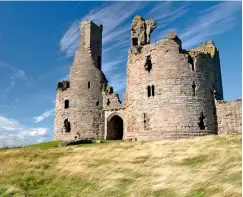  ??  ?? The remains of Dunstanbur­gh Castle’s main gatehouse still reflect the might of the intimidati­ng stronghold.