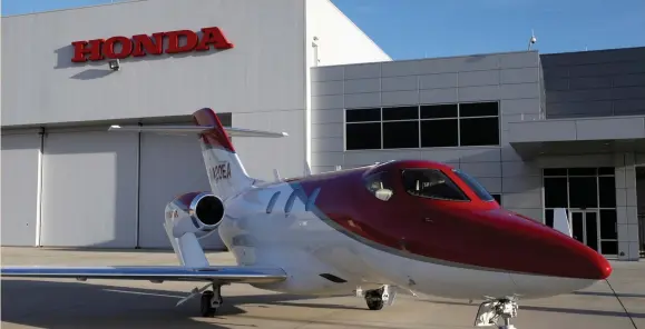  ?? (Maki Shiraki/Reuters) ?? HONDA MOTOR’S HondaJet business jet is seen at Honda Aircraft Company headquarte­rs in Greensboro, North Carolina, last November. The aircraft’s main engineerin­g masterstro­ke is having the engines mounted on the wings, not the fuselage, which reduces...