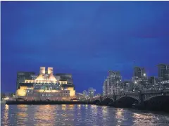  ??  ?? OPEN SECRET: The building housing British intelligen­ce service MI6 is seen by the river Thames in London.