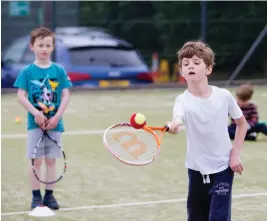  ?? ?? Helensburg­h Tennis Club is also running Easter camps for budding young players