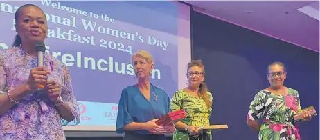  ?? Picture: SOPHIE RALULU ?? Ellen Whippy-Knight (left) speaks at the Internatio­nal Women’s Day breakfast at the Grand Pacific Hotel in Suva this week.