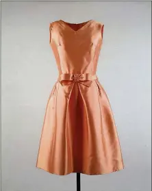  ?? JOHN F. KENNEDY LIBRARY FOUNDATION VIA THE NEW YORK TIMES ?? Jacqueline Kennedy packed this Oleg Cassini dress, which she had worn on a trip to India, for her visit to Texas with her husband, President John F. Kennedy, in November 1963, when he was assassinat­ed.