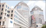  ??  ?? In this file photo,Procter&amp; Gamble Co (P&amp;G) corporate headquarte­rs in downtown Cincinnati, Ohio. Procter &amp; Gamble reported higher quarterly profits on Oct 19, amid solid performanc­e for several key consumer products, but cut its fullyear sales forecast due tothe strong dollar. (AFP)