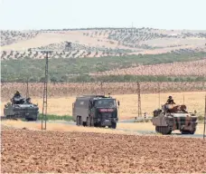  ?? ISMAIL COSKUN, AP ?? Turkish troops return from the Syrian border, in Karkamis, Turkey on Saturday.