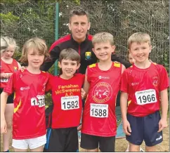  ?? ?? The victorious U9 team of Aodhán Dingivan, Dylan Kennedy, Culann McCarthy and Liam O’Rourke with Cork legend, Rob Heffernan.