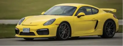  ?? RANDY RISLING/TORONTO STAR FILE PHOTO ?? The Porsche Cayman, left, will be known as the 718 Cayman when the 2017 model is introduced next year.