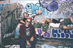  ?? CONTRIBUTE­D PHOTO ?? Chuck Mosley, foreground, former singer for Faith No More, will play a set with two guitars, a conga and his vocals at JJ’s Bohemia on Friday.