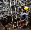  ??  ?? A man at work in the pyramid in Cuernavaca, Mexico