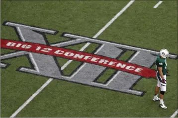  ?? TONY GUTIERREZ — THE ASSOCIATED PRESS FILE ?? The Big 12has revealed its football schedule for the 2024season, its first without Southeaste­rn Conference-bound marquee programs Texas and Oklahoma. The slate incorporat­es new members Arizona, Arizona State and Utah and marks the return of Colorado to the now 16-team league.