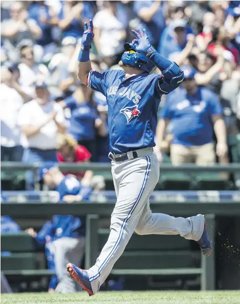  ?? STEPHEN BRASHEAR/GETTY IMAGES ?? Toronto Blue Jays fans from across Western Canada drove down to Seattle to see Josh Donaldson and the boys beat the Seattle Mariners 4-0 on Sunday. When the club visited Seattle last season, they were mired in a September slump but won two of three.