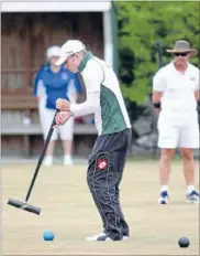  ??  ?? On the ball: New Zealand croquet youth squad and Epsom/Remuera Croquet Club player Hamish McIntosh paired up with Irish player Keiran Murphy.