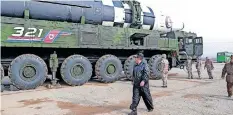  ?? | Reuters ?? NORTH Korean leader Kim Jong Un walks next to an interconti­nental ballistic missile in this undated file photo.