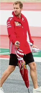  ?? — AFP ?? Long way to go: Sebastian Vettel inspecting the racetrack ahead of the Austrian Grand Prix at the Red Bull Ring in Spielberg, Austria, on Thursday.