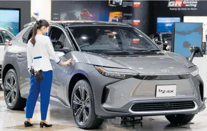  ?? Photo / Bloomberg ?? Toyota’s BZ4X SUV is electric, but the company has argued against a rapid shift to EVS.