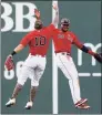  ?? Michael Dwyer / Associated Press ?? Boston’s Hunter Renfroe, left, and Franchy Cordero celebrate after defeating the Angels on Saturday.