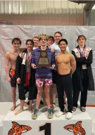  ?? ?? Texas High won the District 15-5A swimming and diving championsh­ip last week at the TISD Aquatic Center. The Tigers ran away with the boys title and the girls team placed third. (Submitted photo)