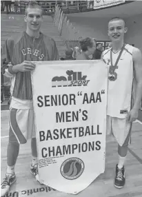  ?? SUBMITTED ?? Jake Simmons, left, and Kyle Gillis helped the Charlottet­own Rural Raiders win the Prince Edward Island School Athletic Associatio­n senior AAA boys’ basketball championsh­ip.