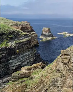  ??  ?? BELOW: The spectacula­r coastal scenery of Deerness; just the place for a mermaid to take her summer holidays.