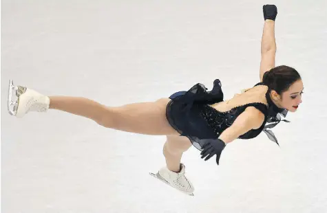  ?? GETTY IMAGES ?? Kaetlyn Osmond executed a fantastic short program Wednesday and sits second at the world figure skating championsh­ips in Helsinki.