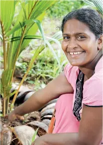  ??  ?? File picture of a coconut grower