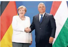  ?? FOTO: GETTY IMAGES ?? Kanzlerin Angela Merkel und Ungarns Premier Viktor Orbán.