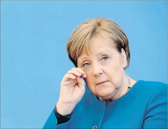 ?? HAYOUNG JEON / EFE ?? La canciller alemana, Angela Merkel, en la rueda de prensa sobre el Covid-19 que dio ayer en Berlín
