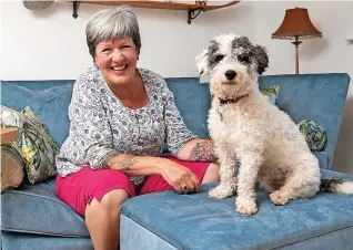  ?? ?? AFFORDABLE: Jackie Kelly and pup Eddie love their new shared ownership home