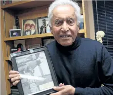  ?? ALLAN BENNER/STANDARD STAFF ?? Welland family physician Dr. Pran Kundi holds a photograph of his uncle Raj Kumar Tejpal, who was reported missing in 1945 during the Second World War. Nearly 73 years later, Kundi has learned his uncle's fate.