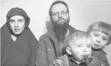  ??  ?? In this file image from video released by Taliban Media in December 2016, Caitlan Coleman is seen with her Canadian husband, Joshua Boyle, and two of the three children she had while in captivity in Afghanista­n.