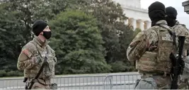  ?? (AFP) ?? Members of Florida National Guard stand guard at the Lincoln Memorial after the last week’s riots at the US Capitol Building, in Washington, DC on Sunday