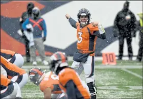  ?? Helen H. Richardson / The Denver Post ?? Denver Broncos quarterbac­k Drew Lock yells to his players as he calls a play in the second quarter during the game against the Kansas City Chiefs Sunday.