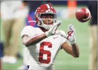  ?? Todd Kirkland / Getty Images ?? Alabama WR DeVonta Smith won the Heisman Trophy on Tuesday night.