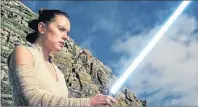  ?? LUCASFILM/AP ?? This image released by Lucasfilm shows Daisy Ridley as Rey in “Star Wars: The Last Jedi.” The film is off to a death star-sized start at the box office. Disney said Friday that the eighth installmen­t in the space franchise has earned an estimated $45 million from Thursday night showings. Disney has sent shockwaves through the industry through its recent acquisitio­n of Fox.