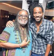  ??  ?? Dean Fraser(left) and Feluke at Appleton’s ‘The Heart of Jamaica’ album launch at Ribbiz Ocean Lounge in Kingston on Tuesday.