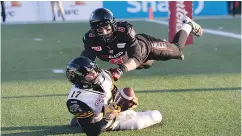  ?? SEAN KILPATRICK / THE CANADIAN PRESS ?? Hamilton Tiger- Cats wide receiver Luke Tasker makes a catch against the Ottawa Redblacks. Tasker is in his fourth season with the Ticats.