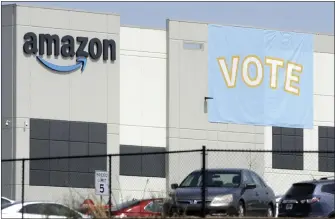  ?? JAY REEVES – THE ASSOCIATED PRESS ?? Amazon workers across the country face fewer hurdles under a new agreement that requires Amazon to inform past and current workers of their rights and ensures that it can’t interfere with labor organizing on company property after hours.
