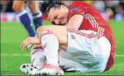  ?? AFP PHOTO ?? Manchester United's Zlatan Ibrahimovi­c reacts after getting injured during the Europa League match Anderlecht on Thursday.