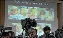  ?? PHOTO: AP ?? Thai media attend a briefing where police display photos of surrogate babies born to Japanese millionair­e Mitsutoki Shigeta.