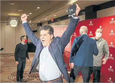  ?? CARLOS OSORIO THE CANADIAN PRESS ?? Unifor president Jerry Dias celebrates a new tentative agreement with GM on behalf of 1,700 members who work in St. Catharines, Oshawa and Woodstock in advance of the strike deadline on Thursday.