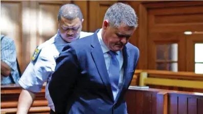  ?? Picture: ANTHONY MOLYNEAUX ?? GOING DOWN: Jason Rohde was found guilty of murdering his wife Susan and attempting to make it look like a suicide in the Western Cape high court on Thursday.