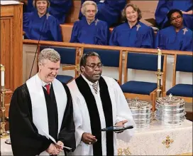  ?? COURTESY OF DAVID KING ?? The Rev. David Lower (left), pastor at Saint Luke’s Presbyteri­an Church, is pictured with the Rev. Eric Powell, pastor at Dodd-sterling United Methodist Church, during a joint church service.