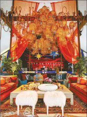  ?? Special to the Democrat-Gazette / JOEL CALDWELL ?? Balinese waterbaske­ts hanging upside down decorate a lounge area covered in oriental rugs at a 40th birthday party designed by Bronson van Wyck.